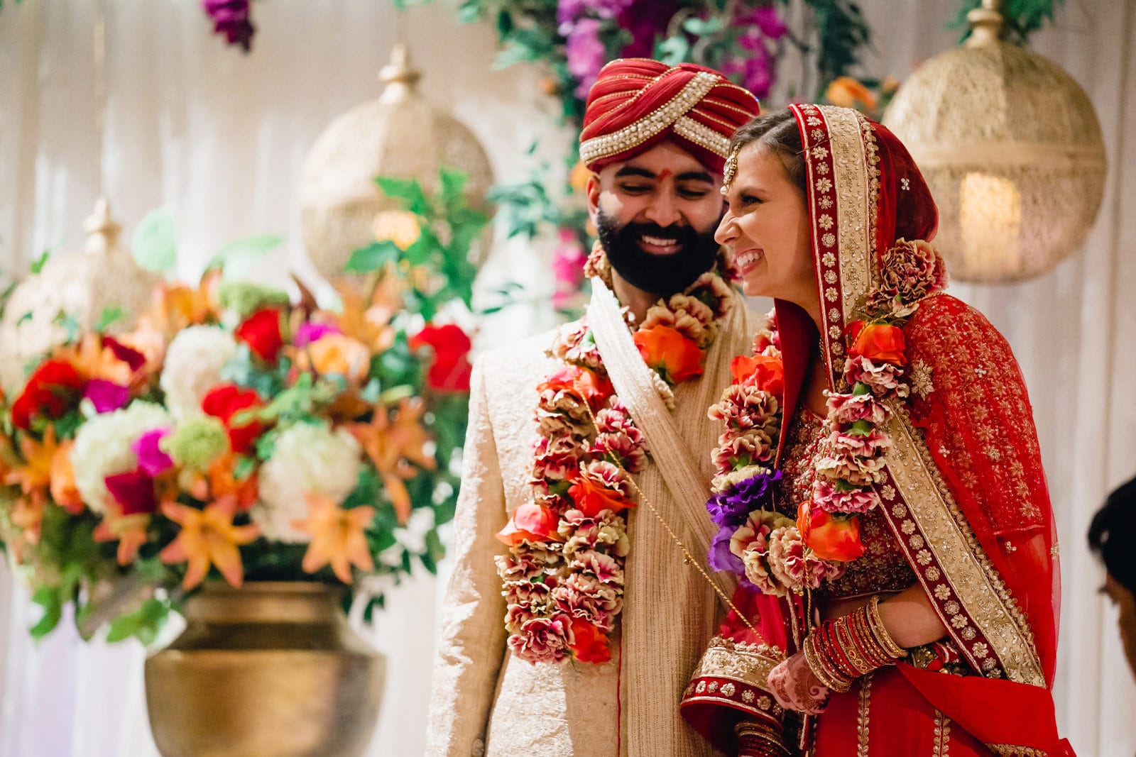 A best of Boston wedding photograph of couple laughing during their Indian American wedding in Providence, RI
