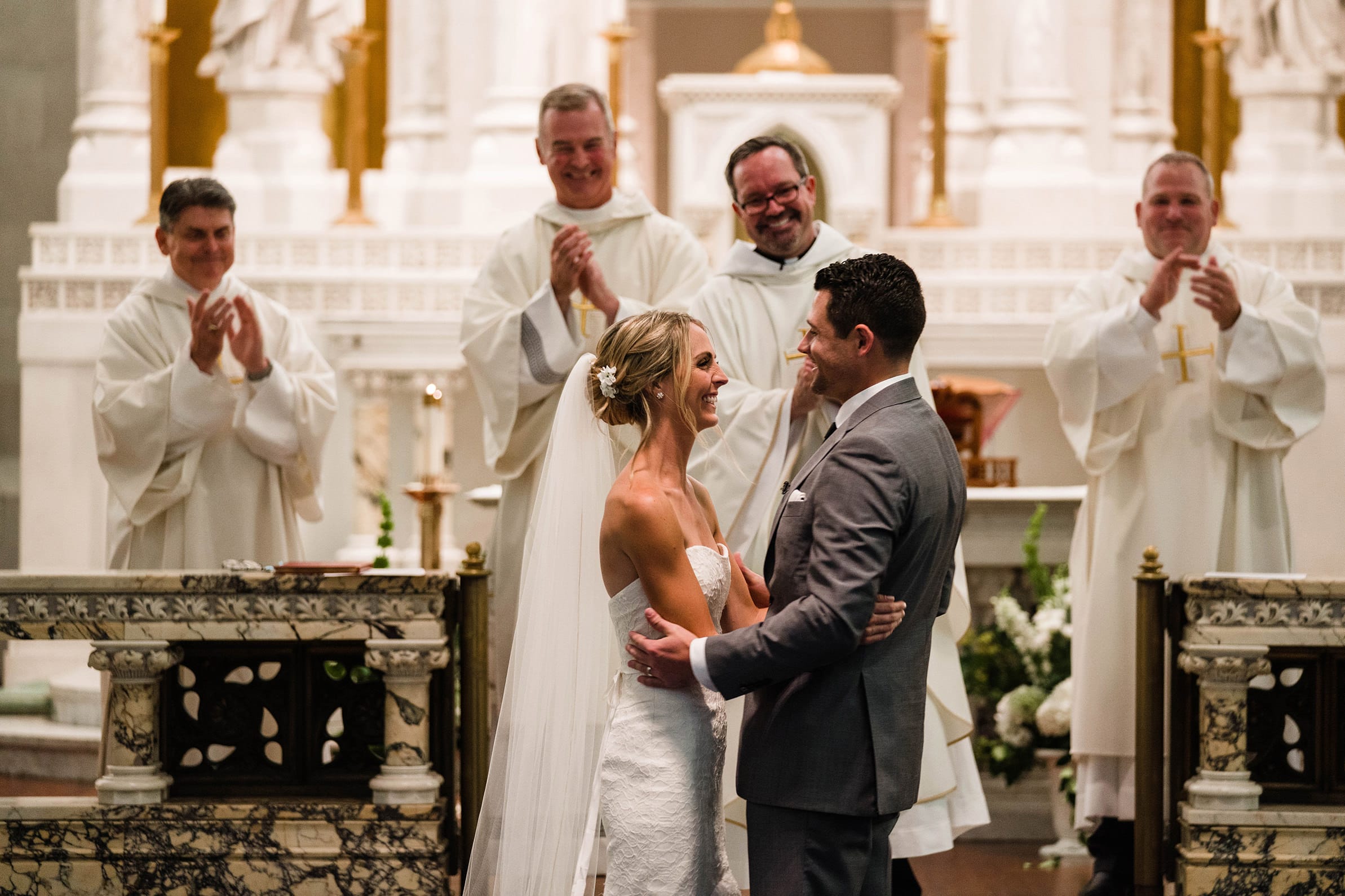 A best of Boston wedding photograph of a bride and groom being announced husband and wife during their State Room wedding