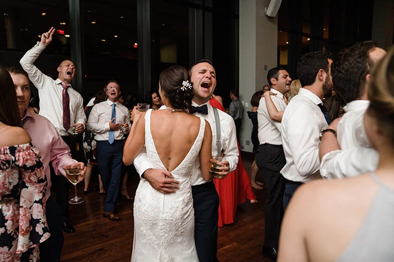 A best of Boston Wedding photograph of a groom dancing with his bride during their State Room wedding