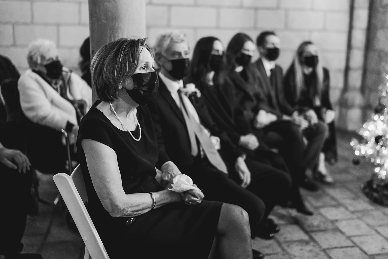 A documentary photograph of a mother waiting her son's wedding ceremony during their intimate Worcester Art Museum Wedding Ceremony